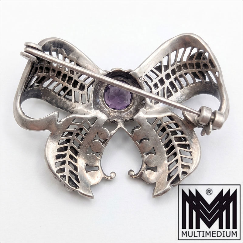 Art Déco Schleifenbrosche Silber 835 mit Amethyst & Markasiten um 1930