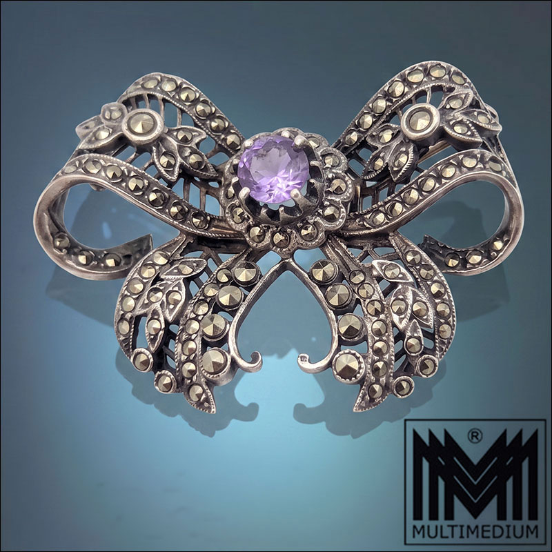 Art Déco Schleifenbrosche Silber 835 mit Amethyst & Markasiten um 1930
