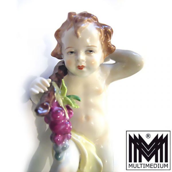 alte antike Porzellan Figur Kind mit Trauben Sitzendorf farbig bemalt